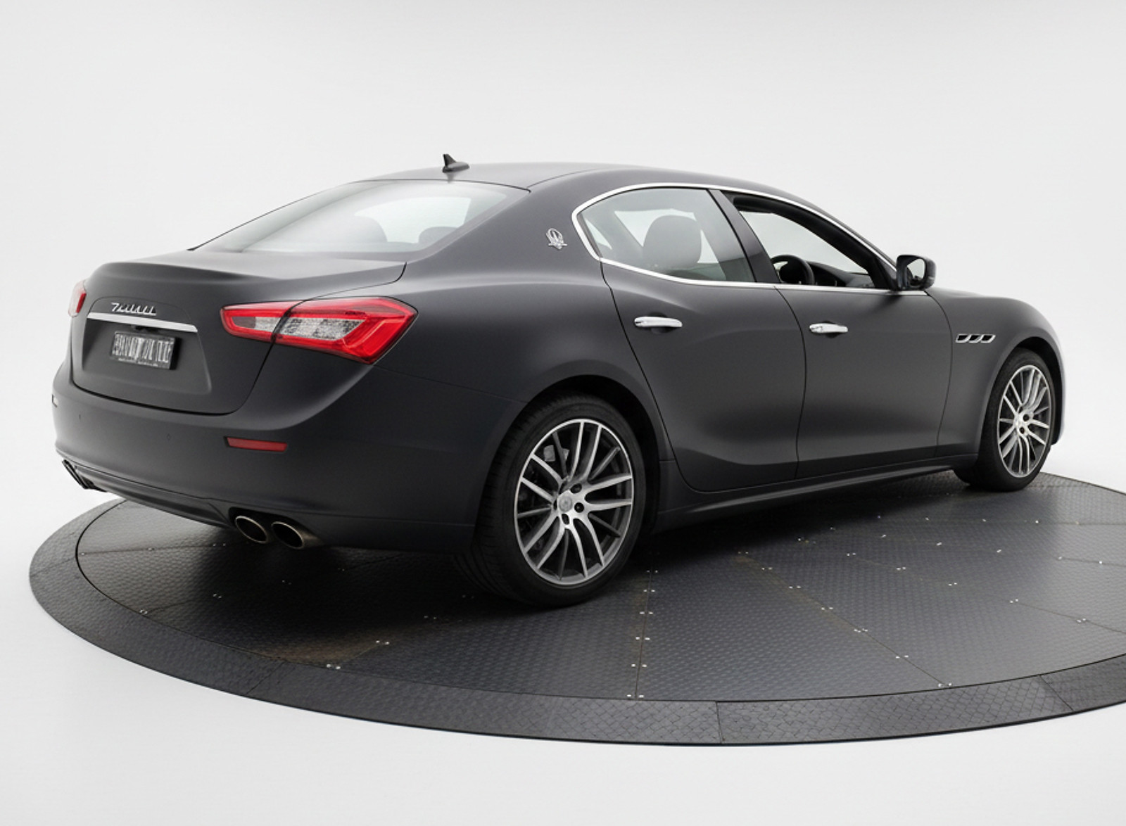Vehicle positioned on a car turntable